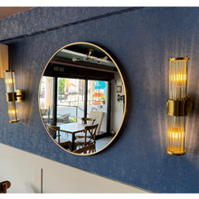 Espejo redondo con marco de aluminio en color oro herrashop