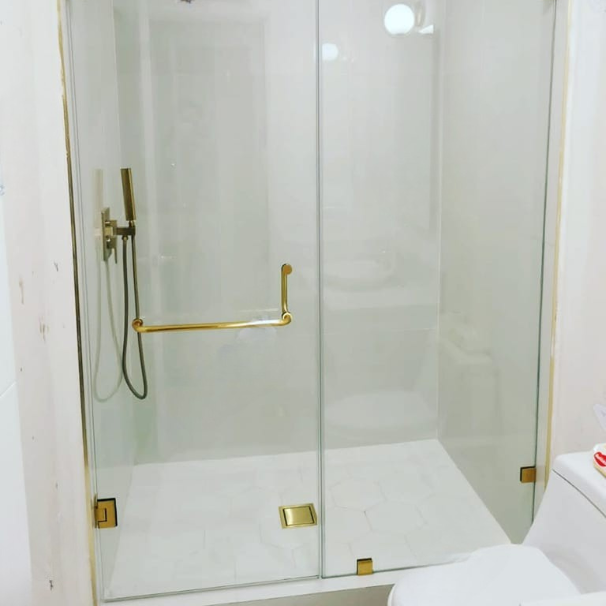 Jaladera dorada para puerta de baño de cristal con Toallero medida 15cm-50cm Herrashop